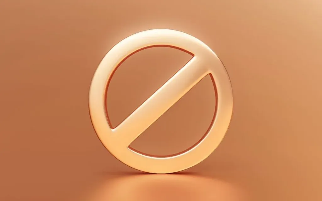 Glossy golden no-entry or prohibition sign standing against a warm peach background
