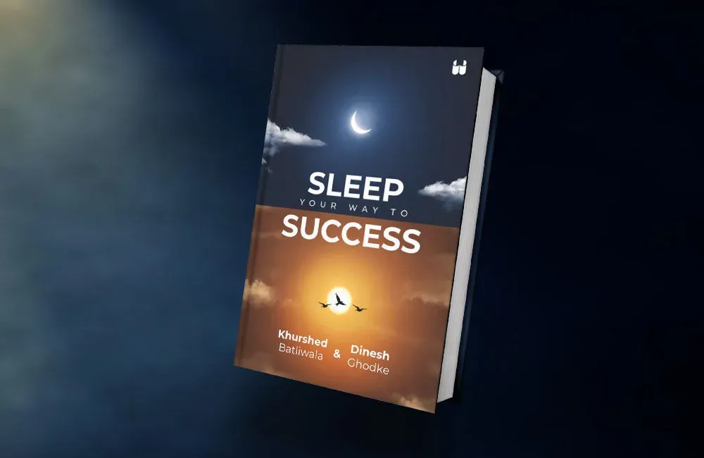 The book Sleep Your Way to Success by Khurshed Batliwala and Dinesh Ghodke, its cover showing a crescent moon
