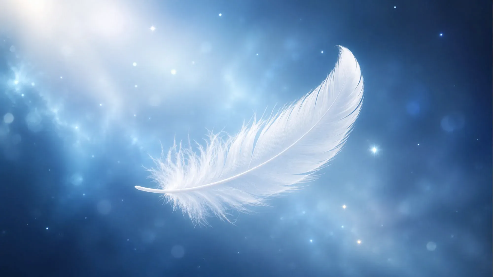 A single white feather drifting through soft blue light