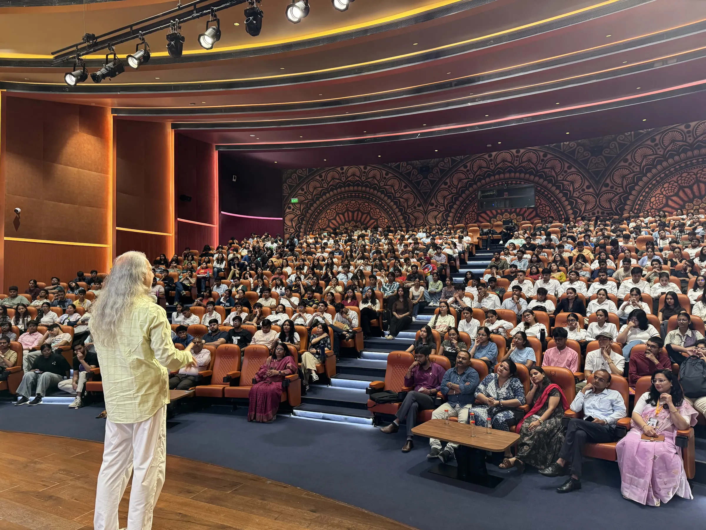 Bawa speaking to a full auditorium at Manipal University Jaipur