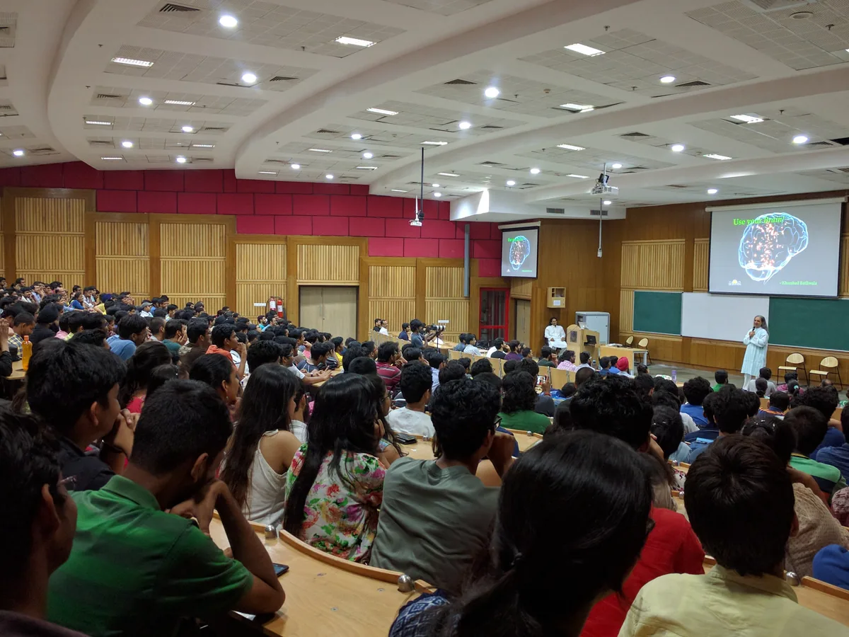 A packed lecture hall watching Bawa speak